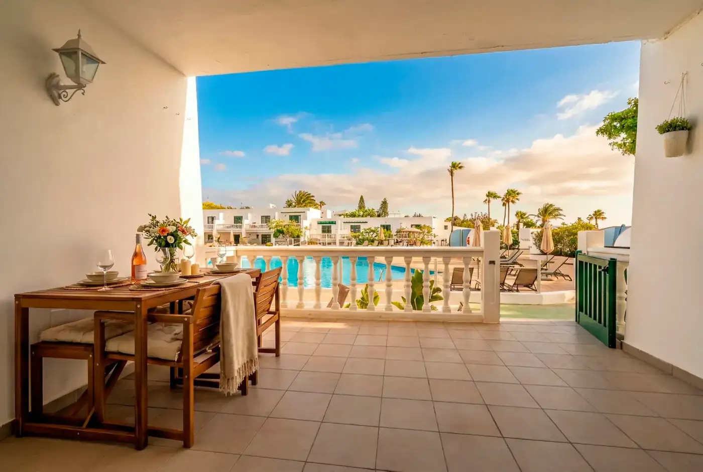Private terrace with pool and dining table at AURALIS luxury apartment, Puerto del Carmen